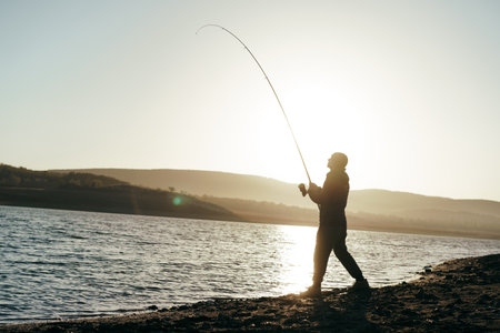 Summer Angling Attire: Lightweight and UV-Protective Clothing for Hot Days in the UK